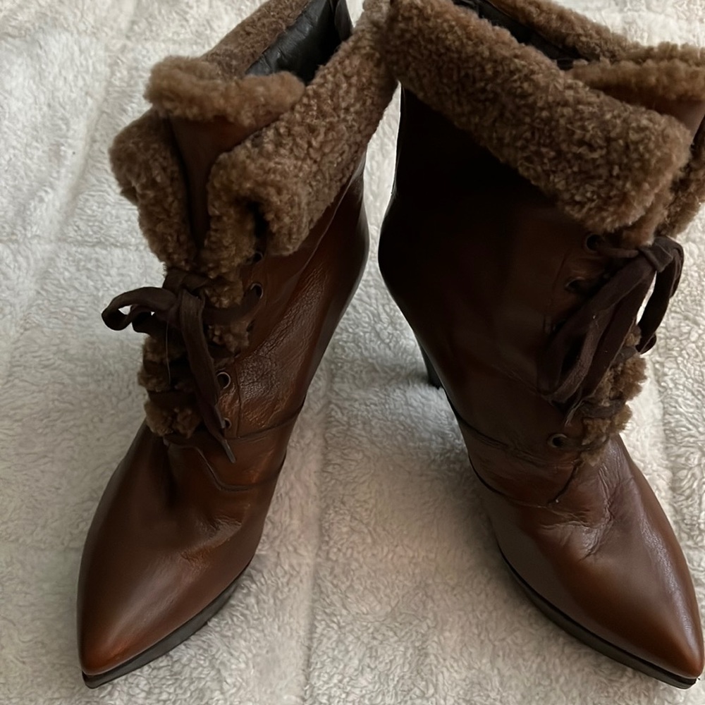 Boots … 4 inches tall … can’t wear them because injuries… to tall